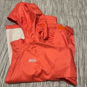 REI rain jacket. Wore probably three times at most